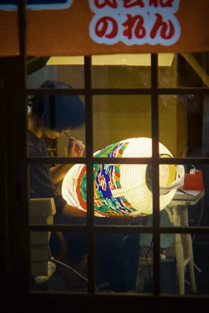 Colorful lantern behind a window, captured with Licht's CineStill 800T emulation